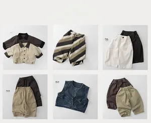 Flat lay showcase of kids cotton shirts and cargo pants in various neutral earth tones