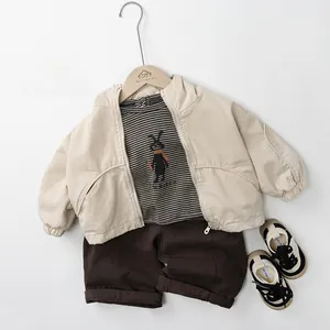 Kids spring 3-piece set with beige jacket, striped rabbit tee and brown trousers