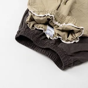 Kids loose casual cargo pants in khaki and dark grey with elastic waist and soft cotton fabric