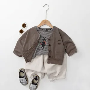 Kids three-piece set with brown cardigan, striped rabbit t-shirt and beige pants