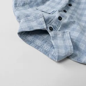 Kids light blue plaid shirt with button-down collar and chest pocket detail