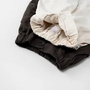 Kids casual wide-leg cotton pants with elastic waistband in brown and cream beige