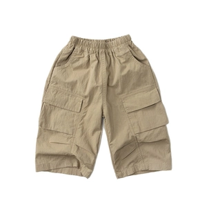 Kids khaki cargo shorts with elastic waist and side flap pockets in minimalist style