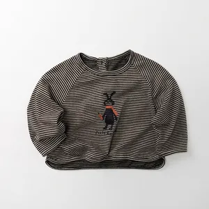 Detail of kids striped long sleeve tee with a cute rabbit embroidery on the chest
