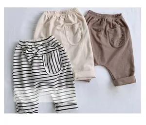 Lot de trois pantalons harem pour bambins en rayé, beige et marron avec poche arrière