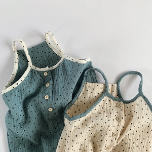 Infant girl floral cotton camisole bodysuit with star print and wooden buttons