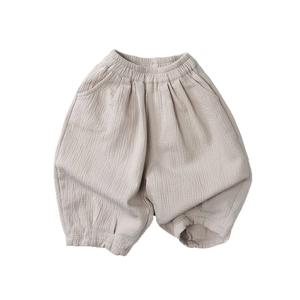 Pantalon sarouel enfant en coton et lin beige avec taille et chevilles élastiques