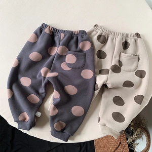 Close-up of girls warm fleece joggers with elastic waist and ribbed cuffs for winter