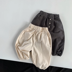 Kids minimalist cotton linen joggers in cream and charcoal grey with elastic waist