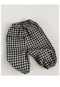 Detail of black and white gingham kids joggers with elastic waist and cuffed ankles
