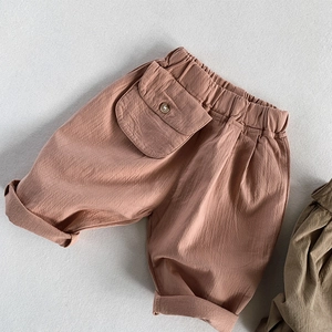 Detail of kids cotton linen casual pants with elastic waist and large cargo pocket