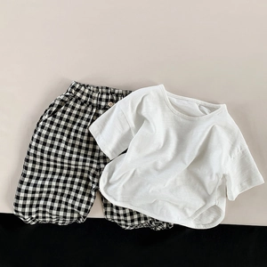 Tenue d'été pour filles avec T-shirt blanc en coton et pantalon large à carreaux noir et blanc