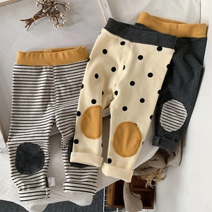 Toddler knitted leggings set featuring striped, polka dot, and solid grey designs with knee patches