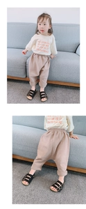 Détail du pantalon harem kaki pour enfant avec taille élastique et chevilles serrées