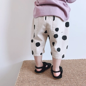 Toddler girl casual outfit with purple long sleeve top and beige polka dot wide leg pants