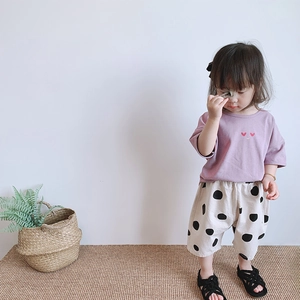 Girls summer outfit with lilac smile heart t-shirt and white polka dot harem shorts