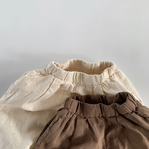 Close-up of elastic waistband on breathable cotton linen shorts for toddlers