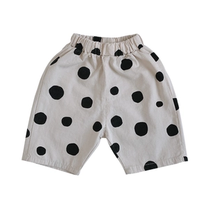 Girls cream polka dot summer culottes with elastic waist and loose wide-leg fit