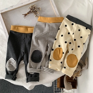 Three pairs of ribbed high waist baby leggings with reinforced knee patches in assorted patterns