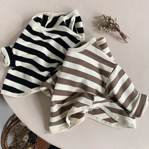 Detailed flat lay of striped long-sleeve cotton T-shirts in black and brown colors