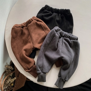 Fleece-lined kids' harem pants in brown, black, and grey for winter warmth and comfort