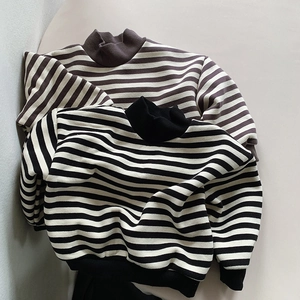 Close-up of black and brown striped fleece sweatshirts with ribbed high collar and cuffs