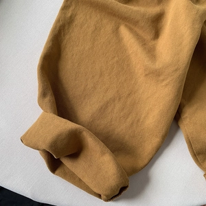 Kids minimalist loose cotton casual pants in camel with cuffed hem detail