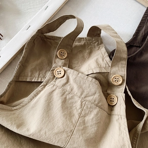 Kids vintage khaki cotton linen overall pants with wooden buttons and knit texture