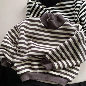 Detailed view of kids' striped fleece sweatshirt with warm high-neck and ribbed cuffs
