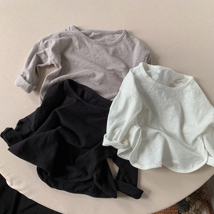 Detailed fabric texture of slub cotton long sleeve t-shirts in grey, black and white