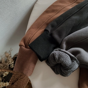 Winter thermal fleece-lined pants for kids featuring thick ribbed cuffs and soft texture
