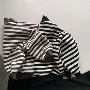 Detail shot of striped polar fleece sweatshirts with ribbed cuffs for kids