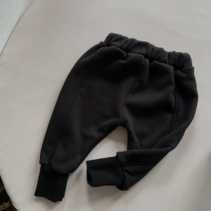 Detailed view of kids warm polar fleece joggers with elastic waistband and ribbed cuffs