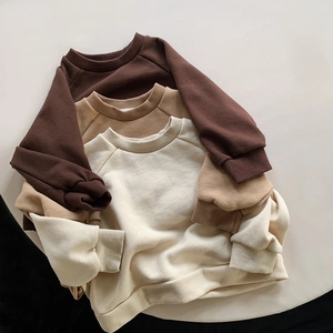 Minimalist kids athletic sweatshirts in coffee, camel and cream with ribbed cuffs