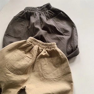 Kids cotton casual pants in dark taupe and light khaki with elastic waist and pockets