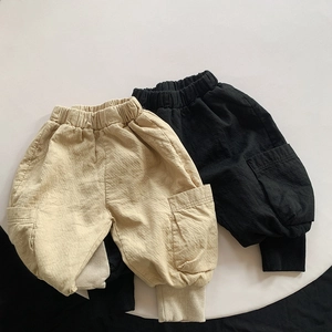 Detailed close-up of double-layer cotton kids cargo pants showing texture and pockets