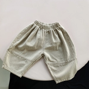 Close-up of kids wide-leg cotton harem pants with elastic waistband and stitch detail