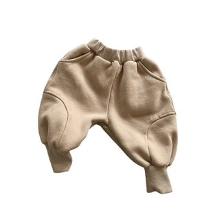 Pantalon sarouel enfant doublé polaire abricot avec taille élastique et bords-côtes