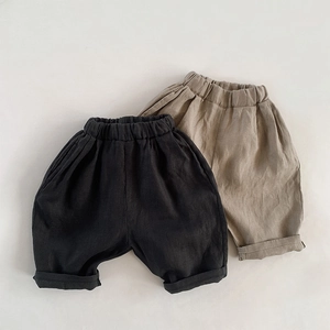 Kids minimalist pure linen loose shorts in black and khaki with elastic waist and rolled cuffs