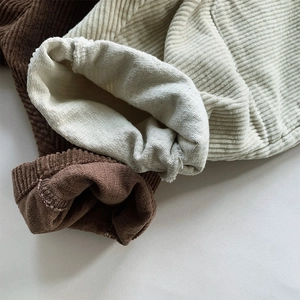 Pantaloni larghi in velluto a coste per bambini in marrone e beige con dettagli