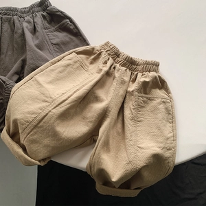 Detailed view of kids cotton linen pants with elastic waist and large side pockets