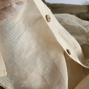 Veste de protection solaire en lin beige pour enfants avec tissu respirant et boutons