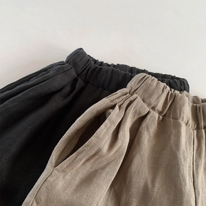 Kids pure linen shorts with elastic waist and side pockets in black and khaki colors