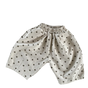Kids polka dot cotton linen shorts with elastic waist and loose fit for summer wear