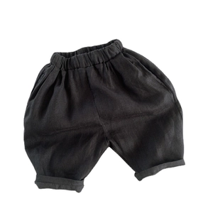 Loose black linen bloomers for toddlers with elastic high waist and folded hem