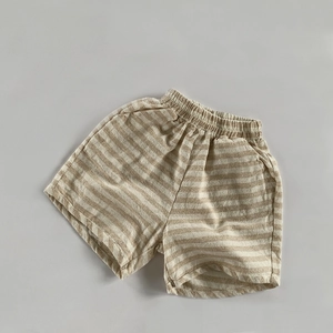 Vue détaillée de la taille élastique et du tissu en lin et coton rayé pour short enfant