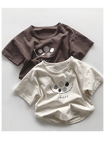 Flat lay detail of brown and cream cotton t-shirts with artistic chart print for kids
