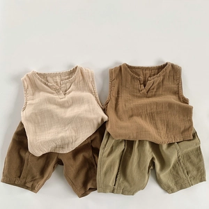 Detail of breathable cotton linen summer sets with V-neck vests and bloomers in earth tones