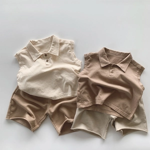 Flat lay detail of kids sleeveless polo shirt and shorts sets in earthy cotton fabric