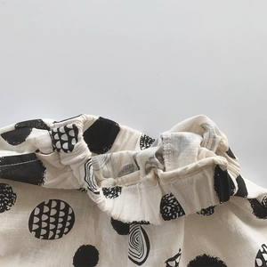 Pantalon enfant en coton de bambou à pois avec taille élastique et base crème